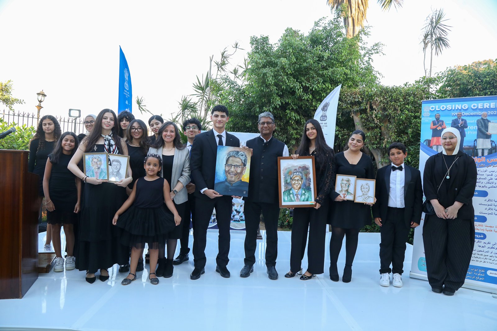 Ambassador Suresh Reddy with 20 children from Donzi Art Academy during the Yoga event